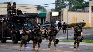 Police in riot gear respond to protesters in Ferguson